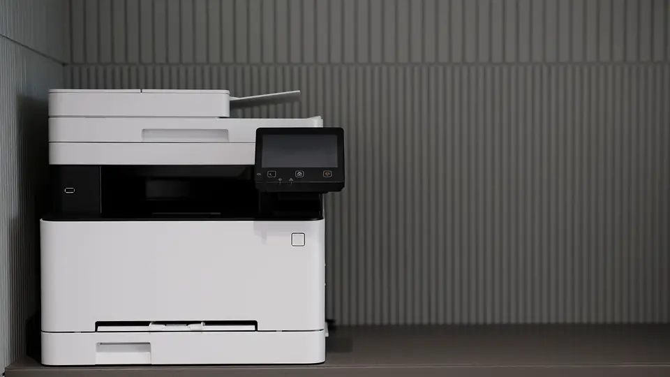 Office printer with fax and scanning built in, on a shelf